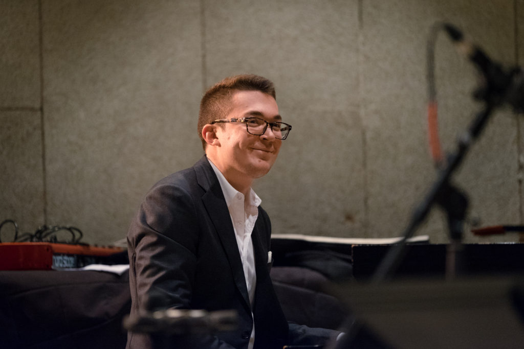 Photo of Henry Dickhoff playing piano.